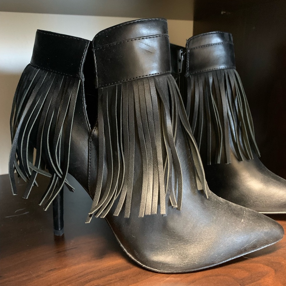 Black side zip booties with fringe